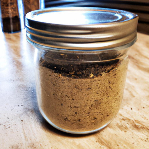 A jar of homemade steak seasoning, ready to be used to season the steak for the Dutch oven recipe.